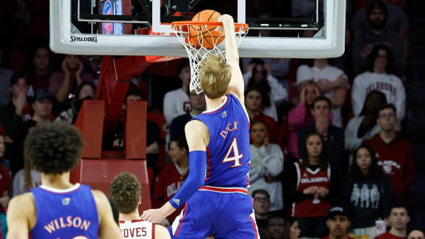 Feb 11, 2023; Norman, Oklahoma, USA; Kansas Jayhawks guard Gradey Dick (4) dunks against the Oklahoma Sooners during the second half at Lloyd Noble Center. Kansas won 78-55. Mandatory Credit: Alonzo Adams-USA TODAY Sports